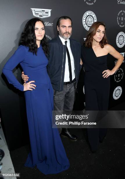 Rain Phoenix, Joaquin Phoenix and Summer Phoenix attend The Art Of Elysium's 11th Annual Celebration with John Legend at Barker Hangar on January 6,...