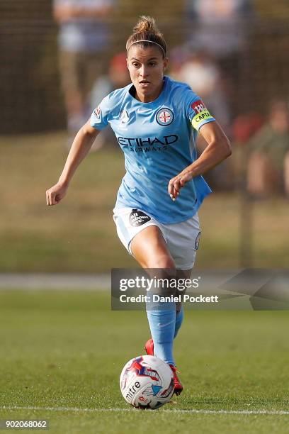 Stephanie Catley of Melbourne City runs with the ball during the round ten W-League match between Melbourne City and Perth Glory at City Football...