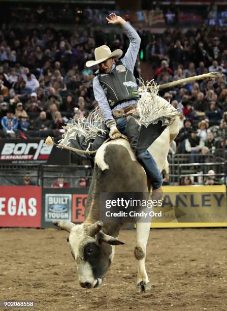 Alex Marcilio rides Slingin Guns during the 2018 Professional Bull Riders Monster Energy Buck Off at the Garden at Madison Square Garden on January...