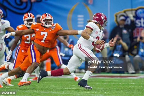 Clemson Tigers defensive lineman Austin Bryant chases Alabama Crimson Tide quarterback Jalen Hurts during the Allstate Sugar Bowl between the Alabama...