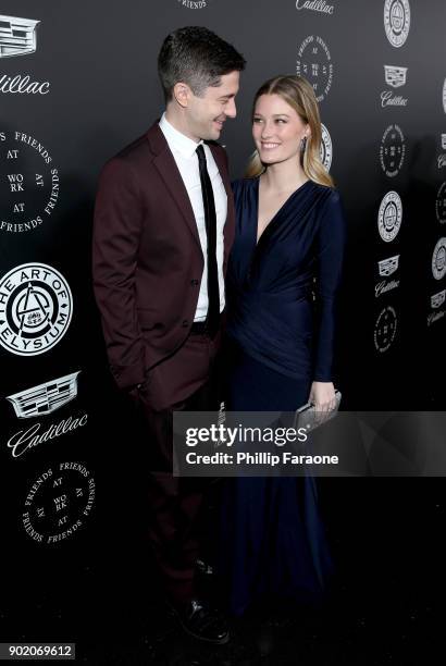 Topher Grace and Ashley Hinshaw attend The Art Of Elysium's 11th Annual Celebration on January 6, 2018 in Santa Monica, California.