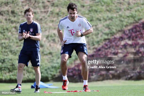 Mats Hummels exercises during an individual training session with coach Peter Schloesser on day 6 of the FC Bayern Muenchen training camp at ASPIRE...