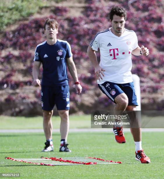 Mats Hummels exercises during an individual training session with coach Peter Schloesser on day 6 of the FC Bayern Muenchen training camp at ASPIRE...