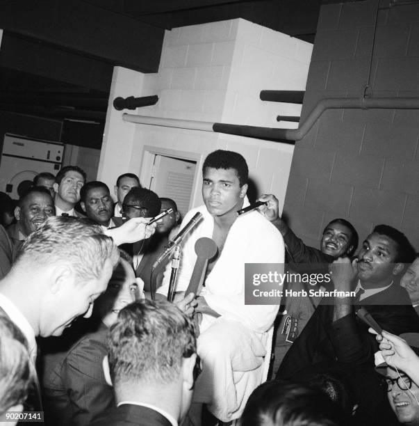 World Heavyweight Title: Muhammad Ali with media before fight vs Cleveland Williams at Astrodome. Houston, TX CREDIT: Herb Scharfman