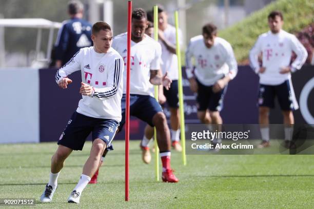 Joshua Kimmich and team mates exercise during a training session on day 6 of the FC Bayern Muenchen training camp at ASPIRE Academy for Sports...