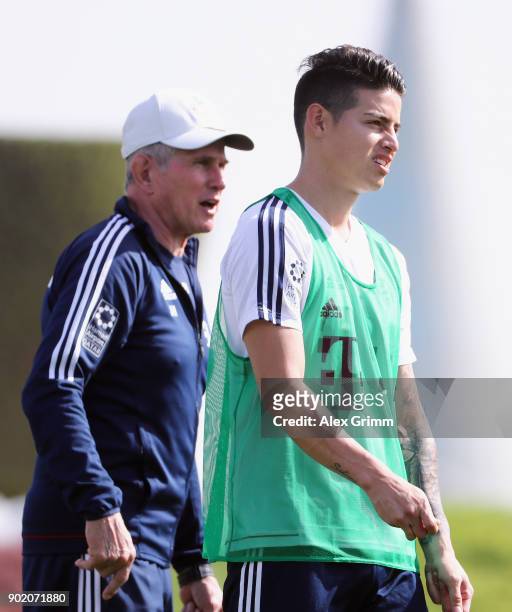 Head coach Jupp Heynckes stands next to James Rodriguez during a training session on day 6 of the FC Bayern Muenchen training camp at ASPIRE Academy...