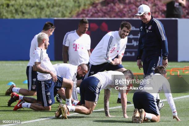Head coach Jupp Heynckes talks to the players during a training session on day 6 of the FC Bayern Muenchen training camp at ASPIRE Academy for Sports...