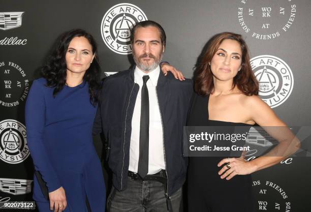 Rain Phoenix, Joaquin Phoenix, and Summer Phoenix attend The Art Of Elysium's 11th Annual Celebration on January 6, 2018 in Santa Monica, California.