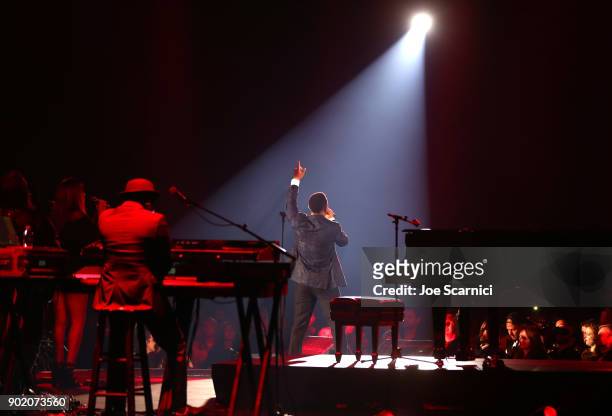 John Legend performs onstage at the Moet Hennessy John Legend's HEAVEN with the Art of Elysium at Barker Hangar on January 6, 2018 in Santa Monica,...