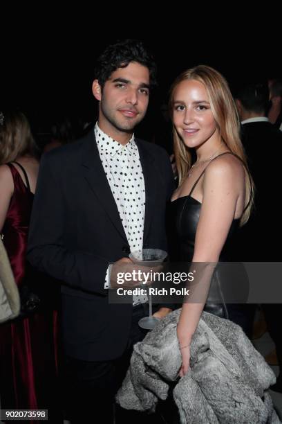 Freddy Wexler and Olivia Zaro attends The Art of Elysium presents John Legend's HEAVEN at Barker Hangar on January 6, 2018 in Santa Monica,...