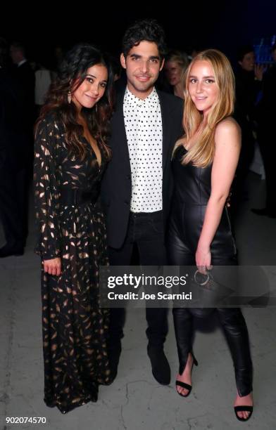 Emmanuelle Chriqui, Freddy Wexler and Olivia Zaro attend the Moet Hennessy John Legend's HEAVEN with the Art of Elysium at Barker Hangar on January...