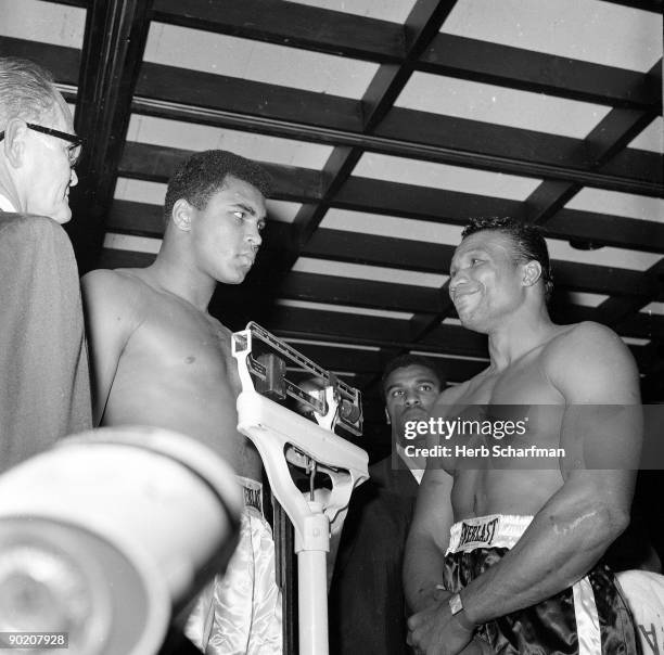 World Heavyweight Title: Muhammad Ali and Cleveland Williams during weigh-in before fight at Astrodome. Houston, TX CREDIT: Herb Scharfman