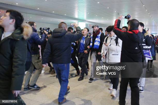 Icelandic footballer Eidur Gudjohnsen arrives by train as he prepares to join Shijiazhuang Ever Bright F.C. Of the China League One on January 6,...