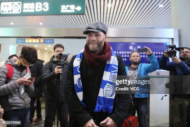 Icelandic footballer Eidur Gudjohnsen arrives by train as he prepares to join Shijiazhuang Ever Bright F.C. Of the China League One on January 6,...