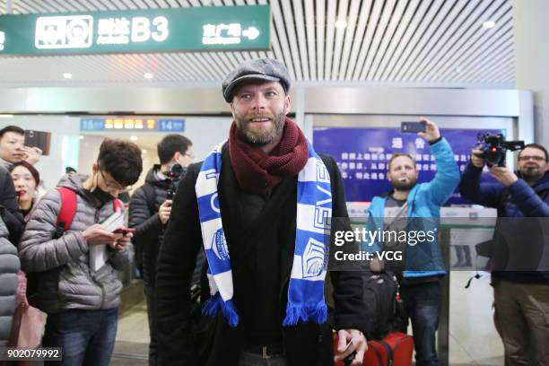 Icelandic footballer Eidur Gudjohnsen arrives by train as he prepares to join Shijiazhuang Ever Bright F.C. Of the China League One on January 6,...