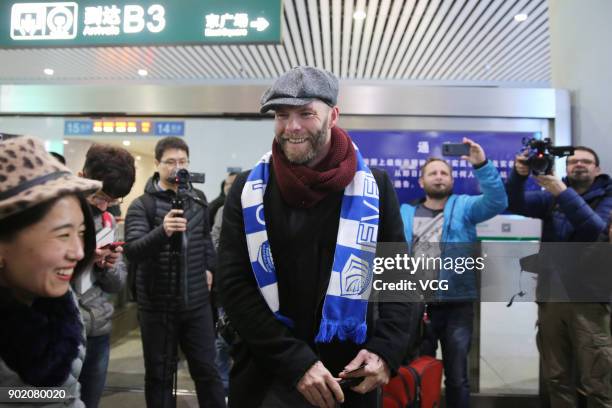 Icelandic footballer Eidur Gudjohnsen arrives by train as he prepares to join Shijiazhuang Ever Bright F.C. Of the China League One on January 6,...