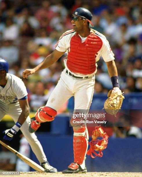 Sandy Alomar Jr. Of the Cleveland Indians catches during an MLB game at Municipal Stadium in Cleveland, Ohio during the 1990 season.