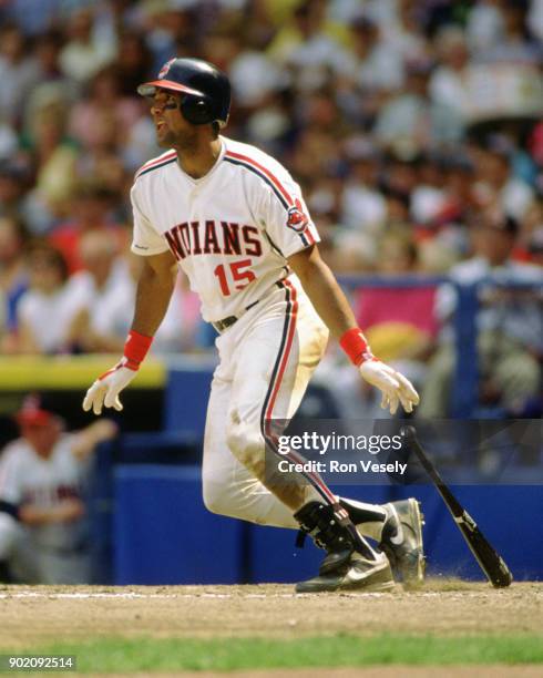 Sandy Alomar Jr. Of the Cleveland Indians bats during an MLB game at Municipal Stadium in Cleveland, Ohio during the 1990 season.