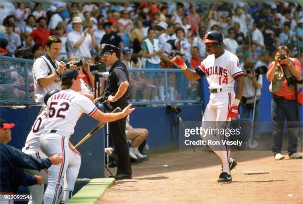 Julio Franco of the Cleveland Indians celebrates during an MLB game at Municipal Stadium in Cleveland, Ohio during the 1990 season.