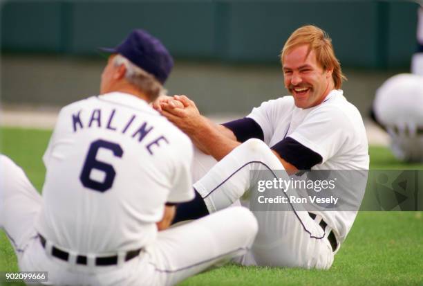 Kirk Gibson laughs while talking to Al Kaline of the Detroit Tigers bats during a major league baseball spring training game at Joke Marchant Stadium...