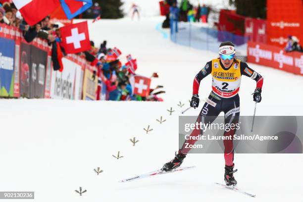 Heidi Weng of Norway takes joint 1st place during the FIS Nordic World Cup Women's CC 9 km F Tour de ski on January 7, 2018 in Val di Fiemme, Italy.