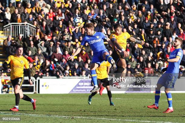 Joss Labadie of Newport County contends with Gaetano Berardi of Leeds United to head the ball towards goal during the Fly Emirates FA Cup Third Round...