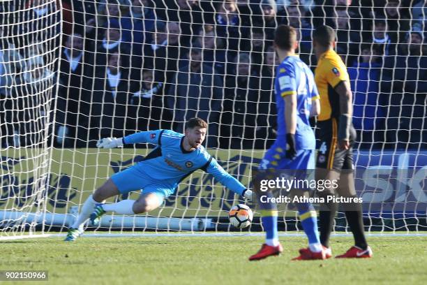 Joe Day of Newport County reaches for the ball as Gaetano Berardi of Leeds United scores his sides first goal of the match during the Fly Emirates FA...