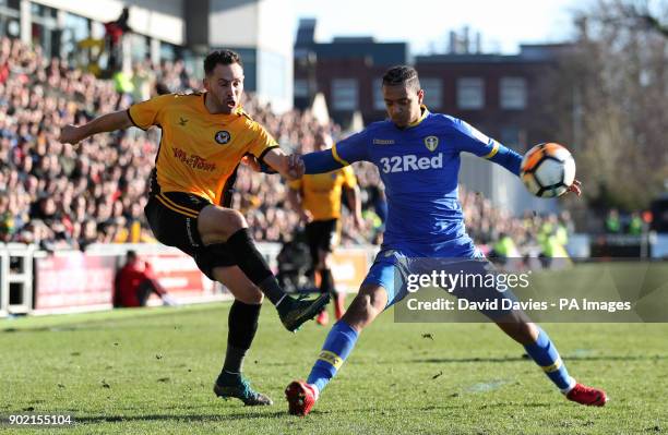 Newport County's Robbie Willmott and Leeds United's Cameron Borthwick-Jackson battle for the ball during the Emirates FA Cup, Third Round match at...