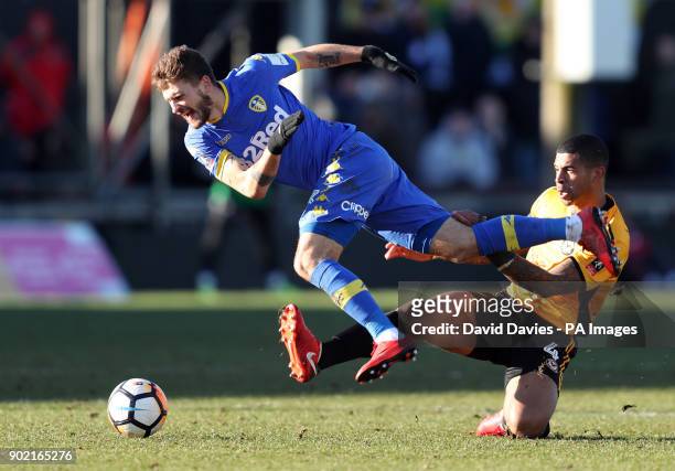 Leeds United's Mateusz Klich is tackled by Newport County's Joss Labadie during the Emirates FA Cup, Third Round match at Rodney Parade, Newport.