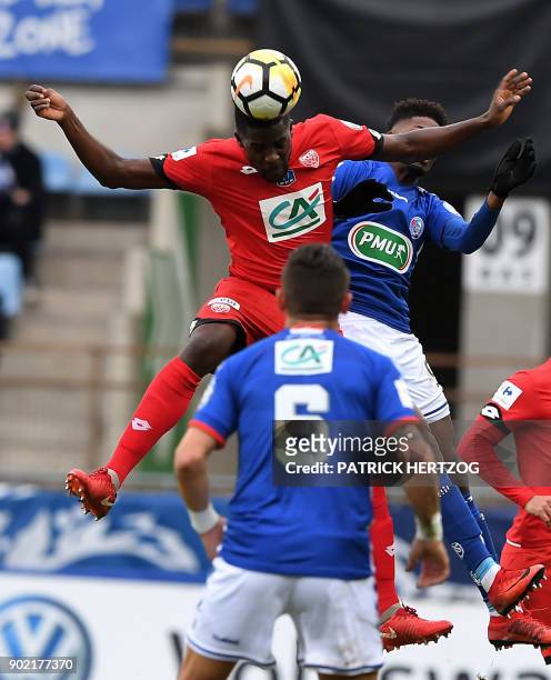 Strasbourg's Cape Verdian forward Nuno Da Costa vies with Dijon's defender Papy Djilobodji during the French Cup football match between Strasbourg...