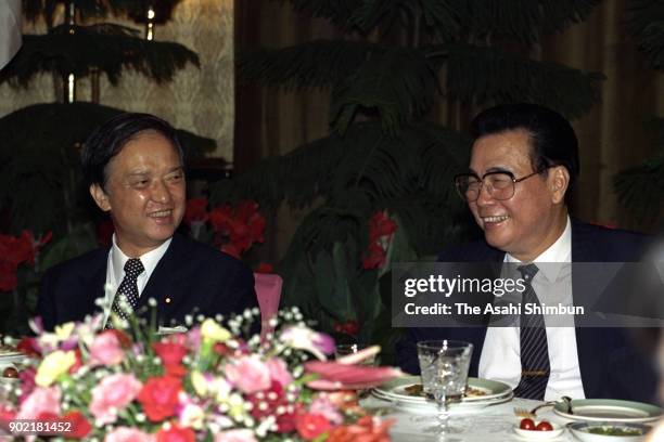 Japanese Prime Minister Toshiki Kaifu and Chinese Premier Li Peng talk during their dinner at the Great Hall of the People on August 10, 1991 in...