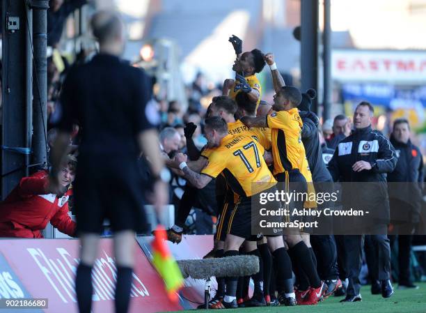 Newport County's Shawn McCoulsky celebrates scoring his side's second goal during the Emirates FA Cup Third Round match between Newport County and...