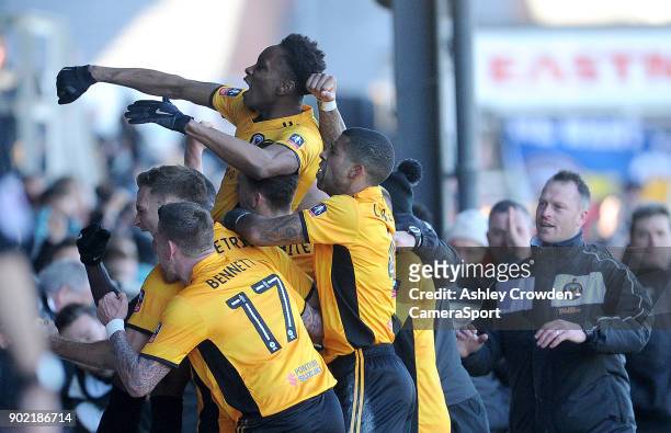 Newport County's Shawn McCoulsky celebrates scoring his side's second goal during the Emirates FA Cup Third Round match between Newport County and...