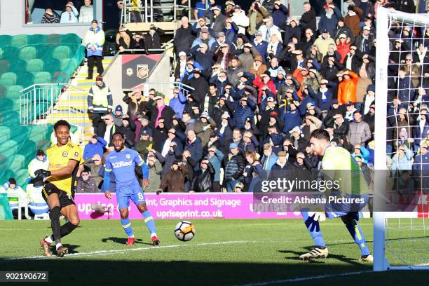 Shawn McCoulsky of Newport County watches as the ball from Frank Nouble cross deflects off Conor Shaughnessy of Leeds United for an own goal during...