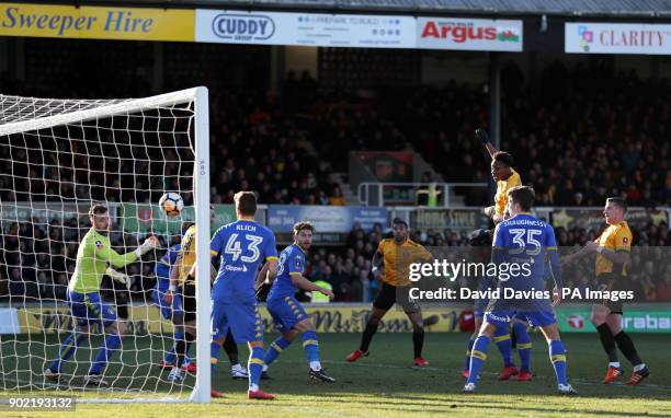 Newport County's Shawn McCoulsky scores his side's second goal of the game during the Emirates FA Cup, Third Round match at Rodney Parade, Newport.