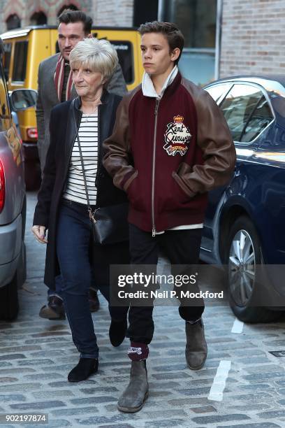 Romeo Beckham and Sandra Beckham attend the Kent & Curwen Presentation at the Floral St Kent & Curwen store during London Fashion Week Men's January...