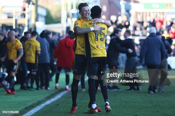 Shawn McCoulsky of Newport County celebrates with Ben White after the final whistle of the Fly Emirates FA Cup Third Round match between Newport...