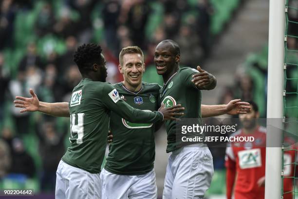 Saint-Etienne's Slovenian forward Robert Beric celebrates with his teammates after scoring a goal during the French Cup football match Saint Etienne...