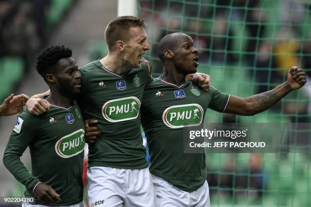 Saint-Etienne's Slovenian forward Robert Beric celebrates with his teammates after scoring a goal during the French Cup football match Saint Etienne...