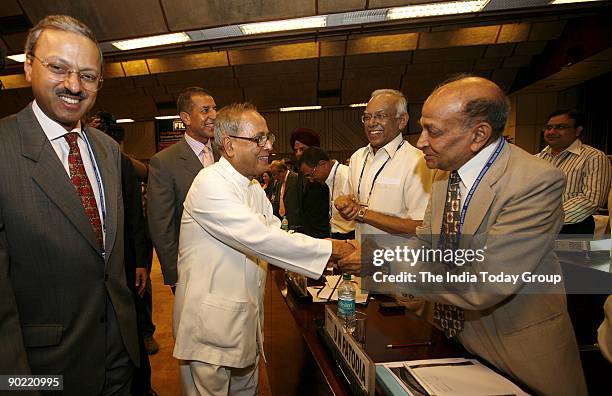 Mr. DN Patodia greets Indian Finance Minister Shri Pranab Mukherjee during the National Executive Committee Meeting of FICCI on August 27, 2009 in...