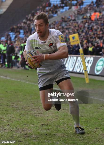 Chris Wyles of Saracens breaks clear to score the first try during the Aviva Premiership match between Wasps and Saracens at The Ricoh Arena on...