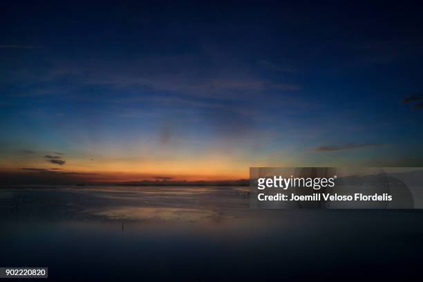 sunset at cordova, mactan, cebu, philippines - joemill flordelis stock pictures, royalty-free photos & images