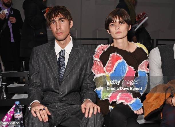 Oscar Scheller and Lara Mullen attends the Christopher Raeburn show during London Fashion Week Men's January 2018 at BFC Show Space on January 7,...