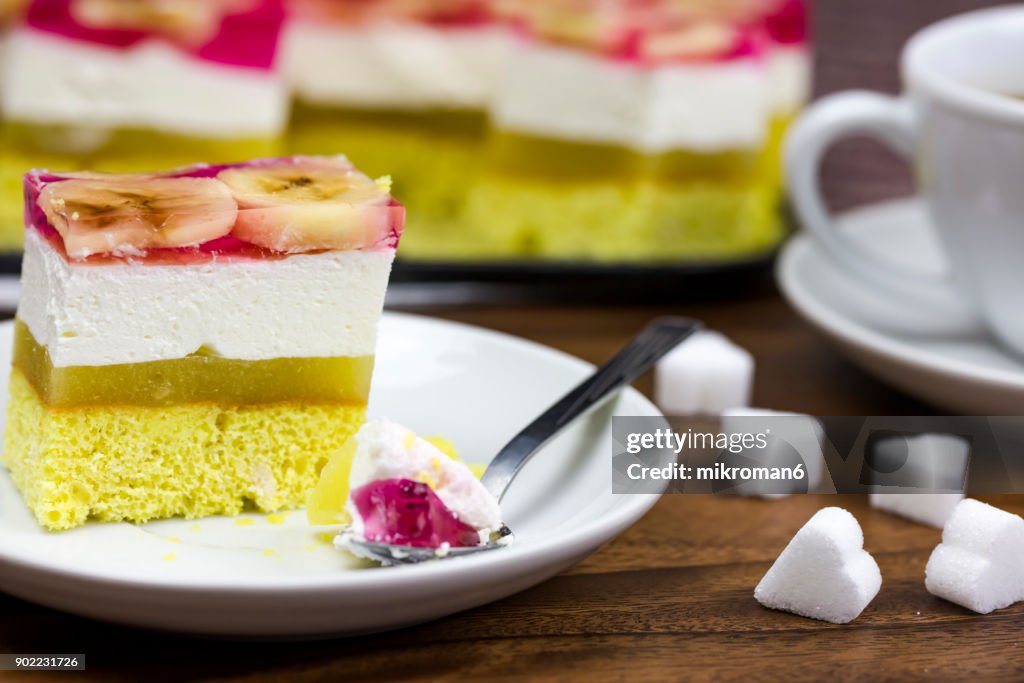 Homemade dessert Apple Pie With Whipped Cream and pink jelly