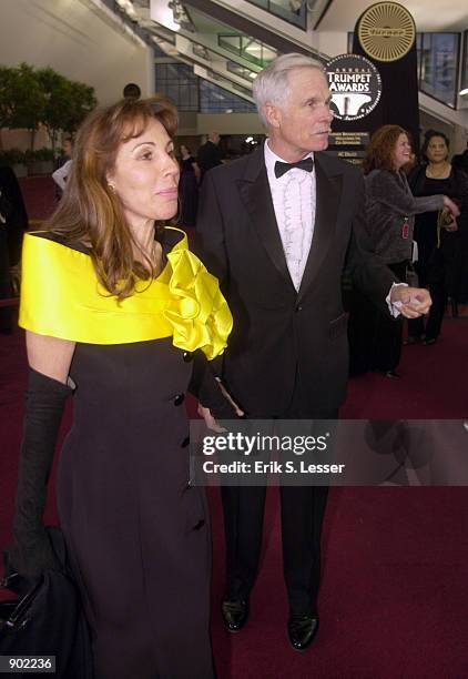 Media mogul Ted Turner and his friend Frederique D''Arragon arrive to attend the 10th Annual Trumpet Awards sponsored by Turner Broadcasting January...