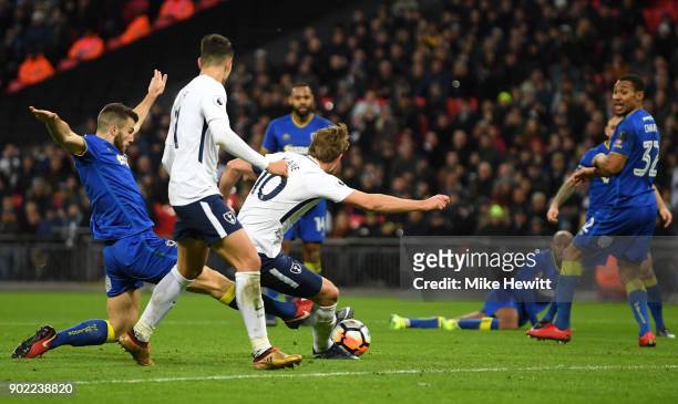 Harry Kane of Tottenham Hotspur scores the second goal during The Emirates FA Cup Third Round match between Tottenham Hotspur and AFC Wimbledon at...