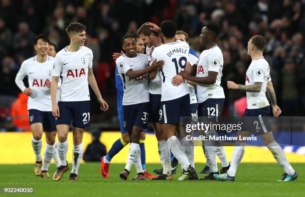 Jan Vertonghen of Tottenham Hotspur is congratulated by team mates on scoring his side's third goal during The Emirates FA Cup Third Round match...