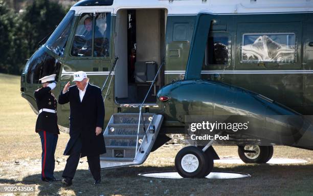 President Donald Trump returns to the White House following a weekend trip with Republican leadership and members of his cabinet at Camp David, on...