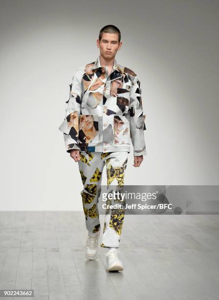 Model walks the runway at the Alex Mullins show during London Fashion Week Men's January 2018 at BFC Show Space on January 7, 2018 in London, England.