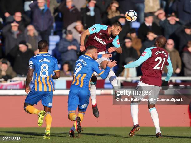 West Ham United's Winston Reid clears from Shrewsbury Town's Carlton Morris during the Emirates FA Cup Third Round match between Shrewsbury Town and...